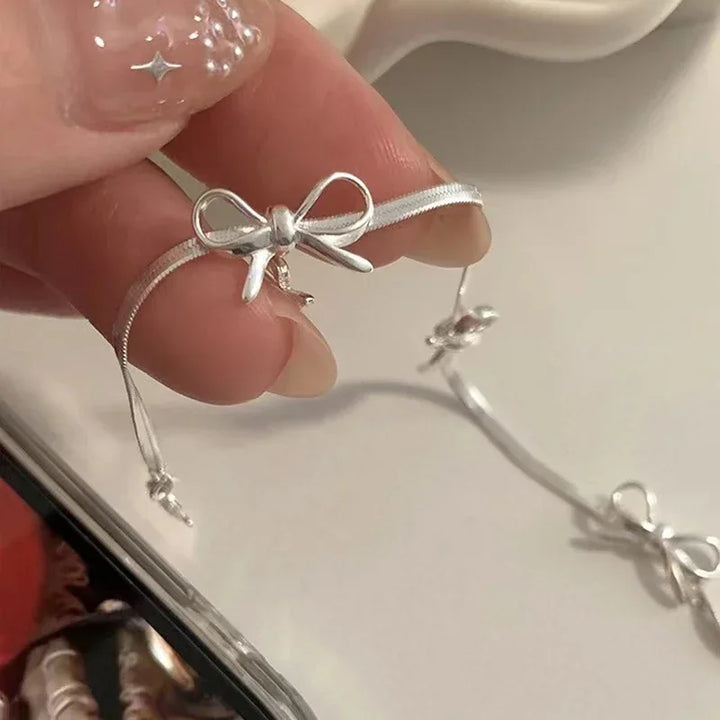 🎀 Ribbon Bowknot Snake Bones Chain Bracelet – Feminine Charm Meets Modern Edge
