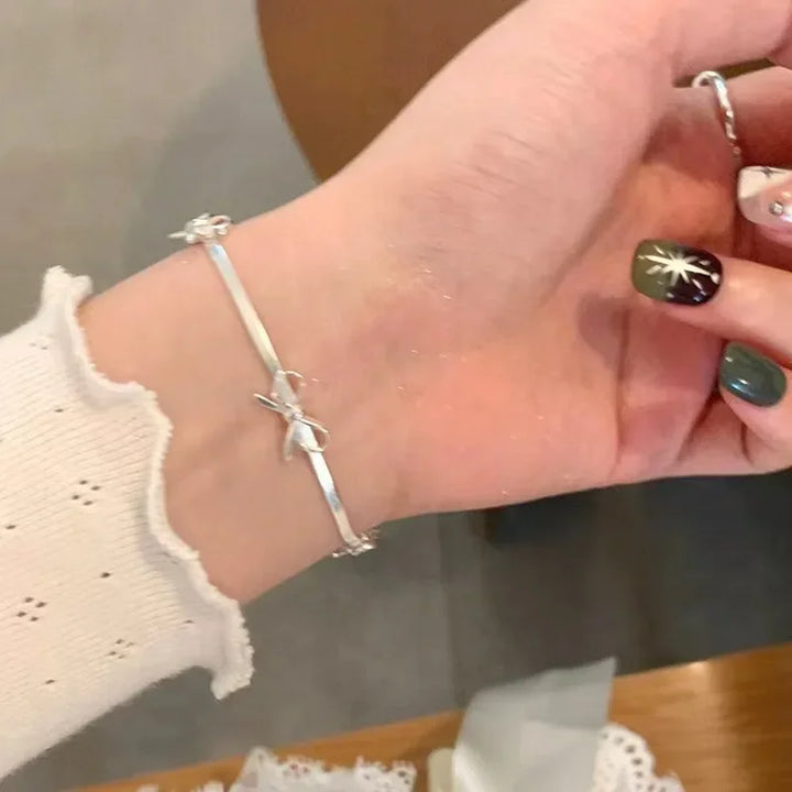 🎀 Ribbon Bowknot Snake Bones Chain Bracelet – Feminine Charm Meets Modern Edge