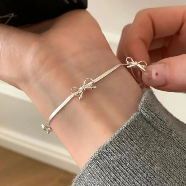 🎀 Ribbon Bowknot Snake Bones Chain Bracelet – Feminine Charm Meets Modern Edge